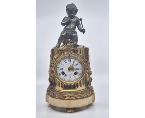 A 19th century Balthazard a Paris French bronze and ormolu mantle clock, having signed white enamel dial with blue Roman nume