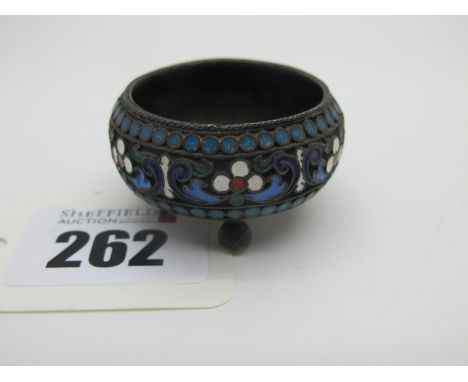 A XIX Century Russian Enamel Salt, highlighted in colours, on three ball feet, stamped "84 AA" over "1894" "HC"(?). 