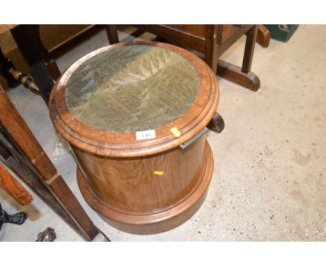 A Victorian circular commode with carpet inset top 