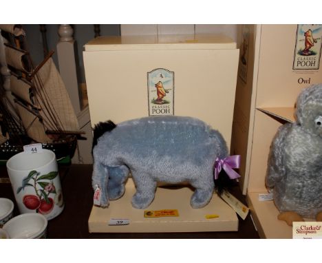 A Steiff "Winnie The Pooh" Eeyore with box and certificate 
