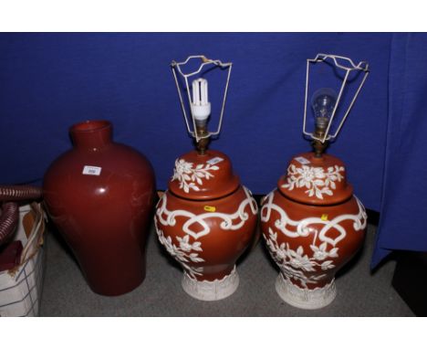 A pair of brown and white decorated ceramic table lamps and a brown meiping-shaped table lamp base