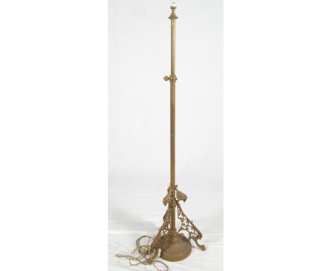 An early 20th Century telescopic brass standard lamp on tripod base