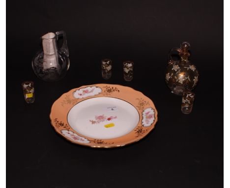 A gilt and floral decorated liqueur decanter, four matching tots, an early 20th Century glass jug and an orange bordered dess
