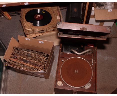 A HMV record player in wooden case and a quantity of 78 rpm records