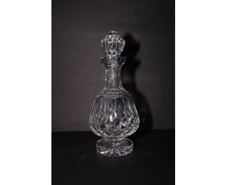 A Waterford pedestal glass decanter cut diamonds and flutes