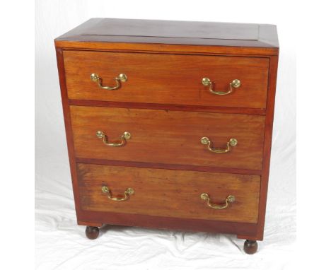 A mahogany chest of three drawers with fielded panel top, 31" wide