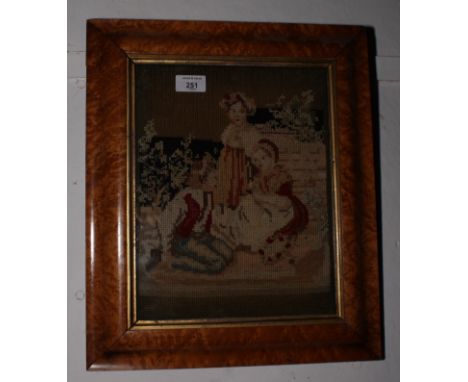A 19th Century needlepoint panel, three children, 12" x 10", in maple frame