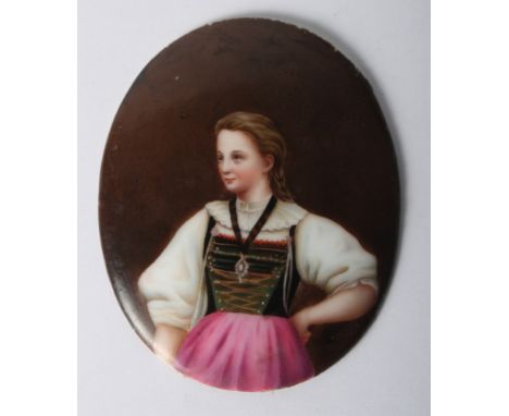 A 19th Century continental porcelain oval portrait panel, woman in regional costume, 3 1/8" x 2 1/2"