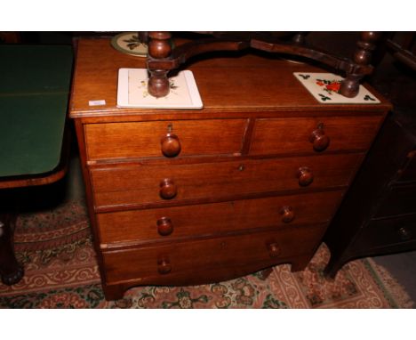 An oak chest of two short and three long drawers, on bracket supports, 36" wide