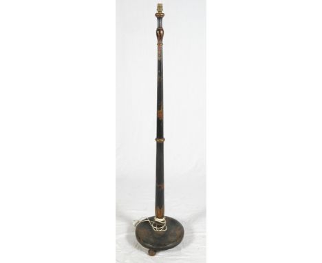 An early 20th Century black and gilt chinoiserie decorated standard lamp on circular base