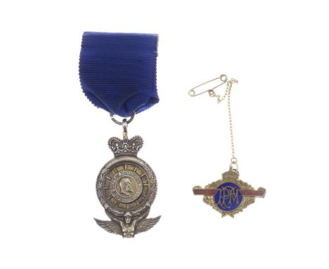 Two lapel badges,comprising Grand Prix Paris 1912 by Fattorini &amp; Sons, gilt metal with enamel, pin back with safety chain