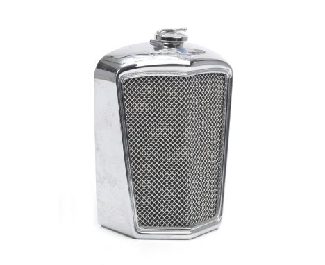 An SS Jaguar radiator decanter by Classic Stable,number JGC B123, chromed surround and grille applied with enamel badge and r