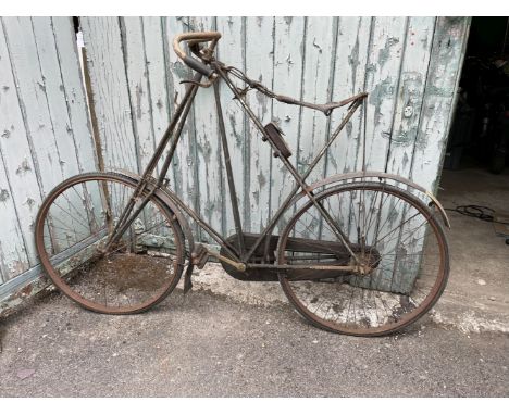 A Dursley Pedersen gentleman's bicycle,cantilever frame with drop handlebars, hammock saddle, mudguards, front and rear lever