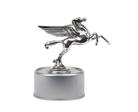 A Mobil Pegasus advertising mascot, 1950s,chrome plated die cast metal, 9cm high, on a display base. For further information 