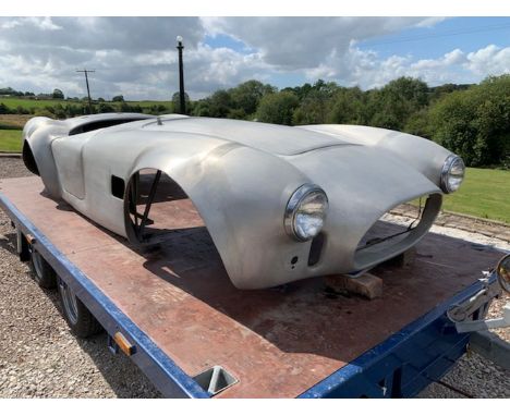 AC Cobra Aluminium BodyshellFootnotes:'The Cobra was Carroll Shelby's dream car. And Carroll Shelby – and maybe only Carroll 