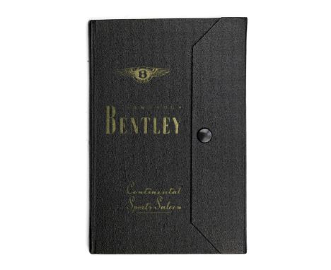 A handbook for the Bentley Continental Sports Saloon,black Rexine wrap-around hard covers with pop-stud fastening, Number XV,