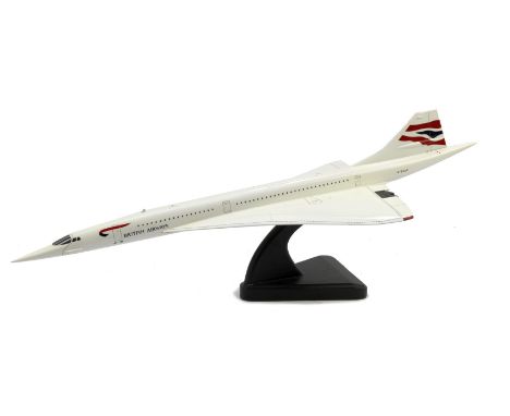 A scale display model of British Airways Concorde,approximately 1:72 scale, believed by Bravo Delta models, carved mahogany w