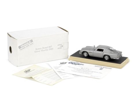 Two 1:24 scale James Bond 'Goldfinger' Aston Martin DB5 die-cast models by Danbury Mint,of the famed 'BMT 216A' car, each fin