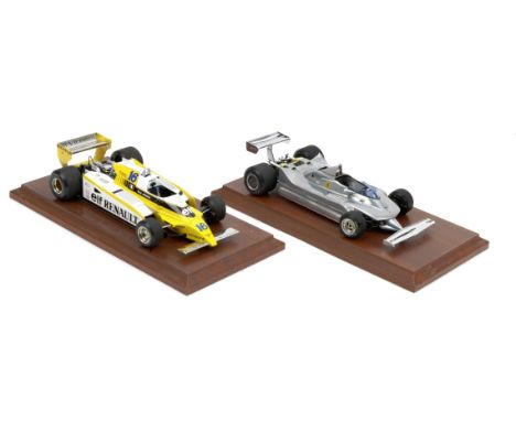 Two 1:18 scale models of Ferrari 312 T4/T5 and Renault RE-20 Turbo F1 cars by Exoto,from the Grand Prix Classics range, finel