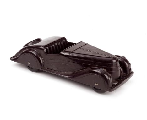 A Bakelite Art Deco style model of a Streamline 2-Seat Open Tourer car, by Codeg, British, 1930s,mottled brown Bakelite body 