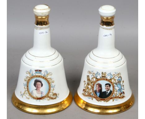 Two Wade Commemorative porcelain decanters and sealed contents of Bells Scotch whisky.