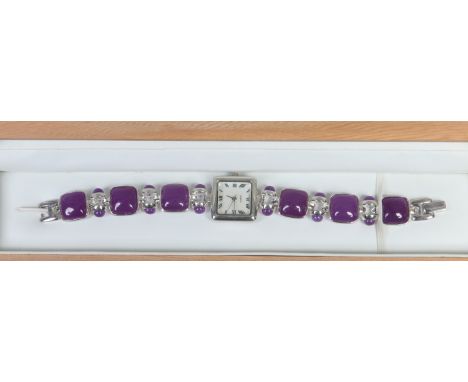 A ladies silver and lilac jade bracelet watch with quartz movement.