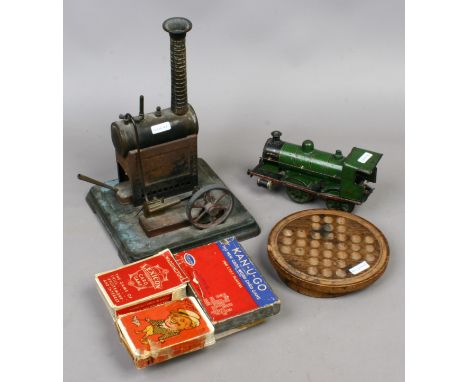 A group of vintage toys and games to include a model steam engine, Holdorn o gauge model train, solitaire, card games etc.