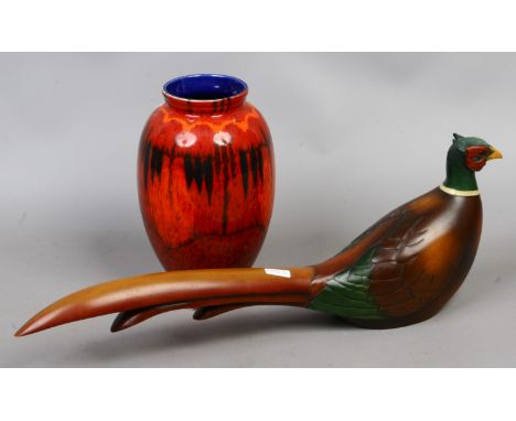 A Poole pottery vase and limited edition 38/2000 carved model of a ring necked cock pheasant.