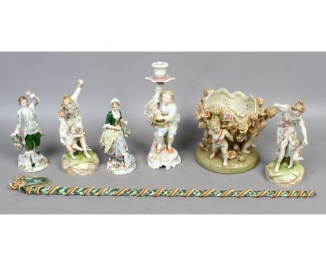 A group of porcelain figures to include Sitzendorf and two similar figural candlesticks and posy bowl, along with a glass bar