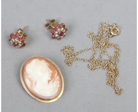 A 9ct gold necklace 2 grams, a pair of 9ct gold ruby and diamond cluster ear studs and a 9ct gold mounted cameo brooch.