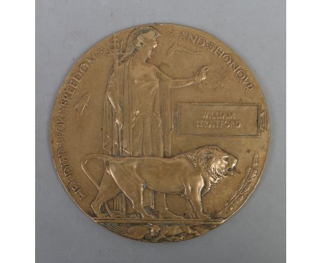 A World War One bronze death plaque to William Stratford.