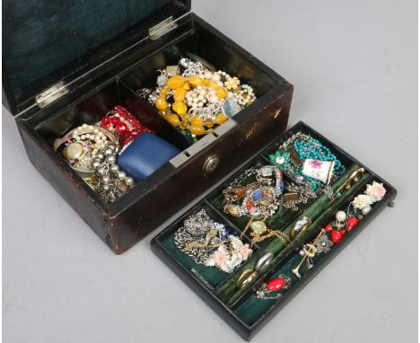 A leather mounted fitted jewellery box and assorted vintage costume jewellery including amber effect beads, simulated pearls 