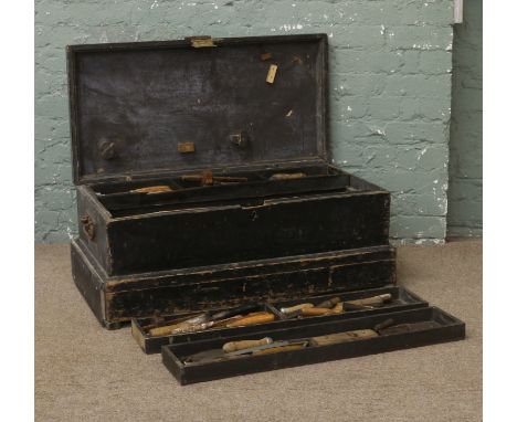 A painted pine cabinet makers tool box and contents of associated tools.