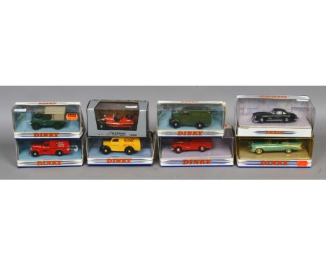 Eight boxed vintage Diecast model cars, mostly Dinky.