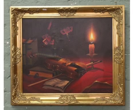 A gilt framed oil on canvas, candle lit view of a violin and bow, signed.