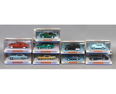 Nine boxed vintage Dinky Diecast model cars.