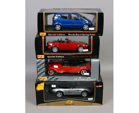 Four boxed Maisto 1/18 scale Diecast model vehicles including BMW, Citroen and Mercedes.