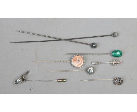 Six silver stick pins including malachite example and two silver hat pins.