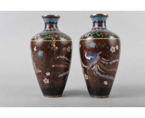 A pair of cloisonne enamel vases with Phoenix and insects on an aventurine ground, 7" high (slight damages) 