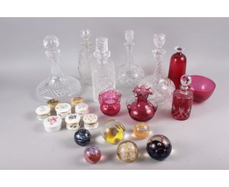 A Caithness "Moon Crystal" paperweight, five other paperweights, five decanters, cranberry glassware and eight pill boxes 