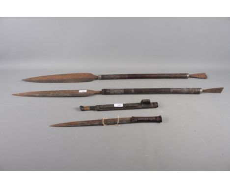 Two East African carved hardwood spears, 40" long, and a similar knife and scabbard, 19" overall including scabbard