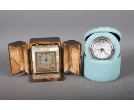 An early 20th century abalone cased desk clock with gilt Arabic numerals, in leather case, 3" overall, and a Penhaligon's qua