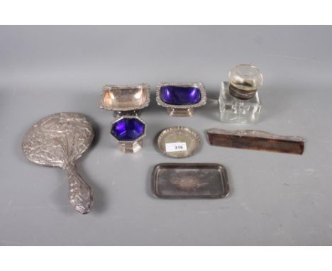 A silver hand mirror, decorated flowers, a silver mounted comb, a rectangular silver pin dish and various silver plated items