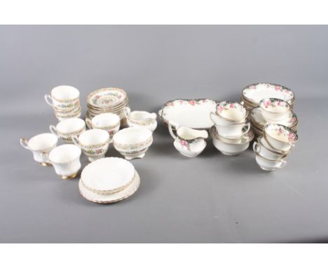 A Coalport "Ming Rose" pattern part teaset, an Aynsley part teaset and two Royal Albert "Val D'Or" pattern teacups, saucers a