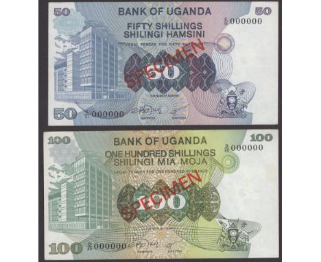 Bank of Uganda, specimen 50 Shillings, ND (1979 light issue), serial number C/51 000000, and specimen 100 Shillings, ND (1979