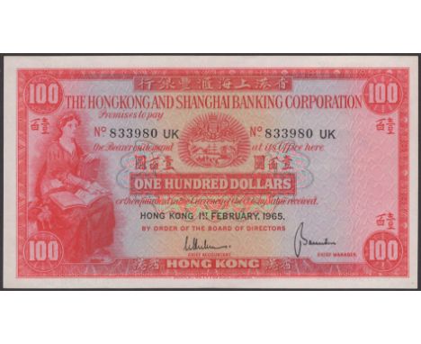 Hong Kong & Shanghai Banking Corporation, $100, 1 February 1965, serial number 833980UK, Hutson and Saunders signatures, ligh
