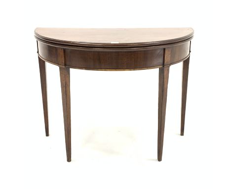 Georgian mahogany demi-lune card table with fold over top revealing baize lined playing surface, raised on square tapered sup