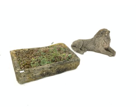 Small composite stone garden recumbant lion, (L62cm) and a rectangular shallow stone trough, (W70cm) Condition Report & Furth