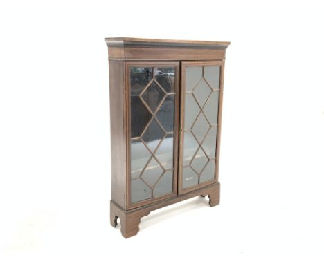 19th century inlaid mahogany floor standing bookcase, with astragal glazed doors enclosing two adjustable shelves,  bracket f