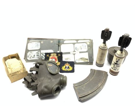 Fifty-nine US Army Air Forces aircraft recognition slides, two 2-inch parachute illuminating mortar casings, gas mask, mid-20